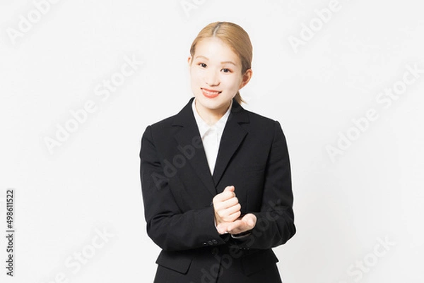 Fototapeta 納得のポーズをするジャケットを着た女性