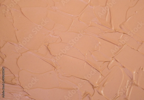 Fototapeta Makeup base cream blur, red clay mask texture. Background
