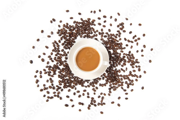 Fototapeta a cup of coffee with coffee beans on white background