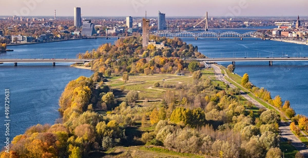 Fototapeta Panoramic view over the Riga city, Latvia, Island bridge, and Zakusala during sunny day