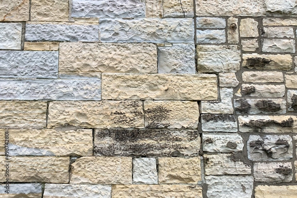 Obraz Grey and brown textured block wall