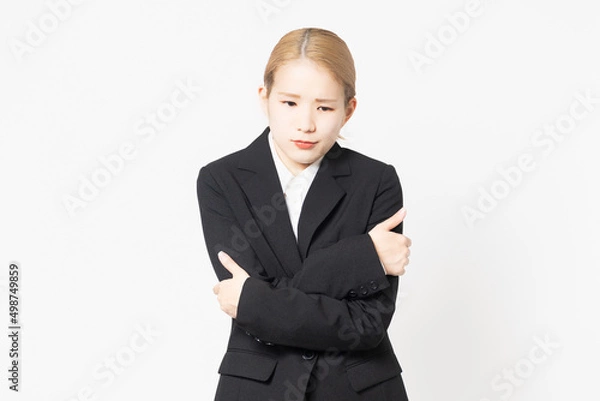 Fototapeta 体調不良で疲れているジャケットを着た女性