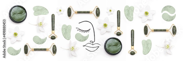 Obraz Creative modern selfcare concept. Banner made with surreal woman face and set of cosmetic tools for self-care. Face rollers, massager gua sha scraper, cosmetic collagen patches on white background