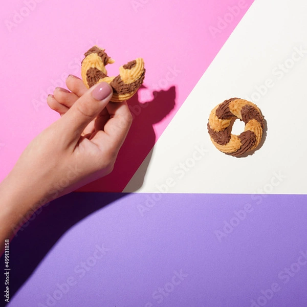 Obraz conceptual photography, hands reaching for the cookies. top view