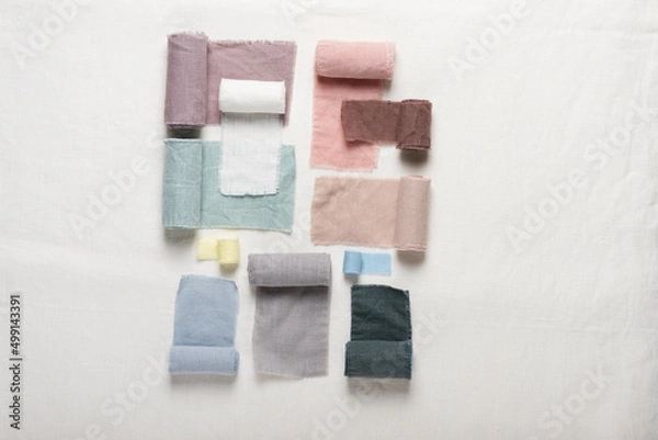 Obraz Different colors fabric samples on the white table