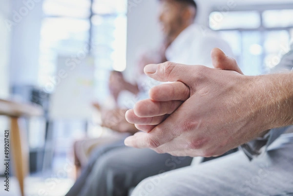 Fototapeta Thats something we can get on board with. Cropped shot of a businessman clapping hands during a conference.