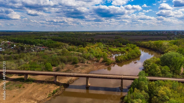Fototapeta railway and road bridges across the river from a height, summer, sunny weather