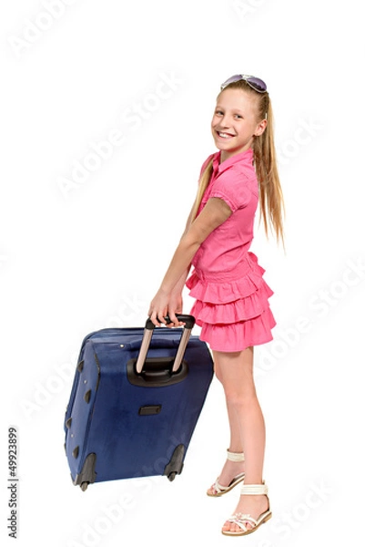 Fototapeta Smiling girl with suitcase and sunglasses