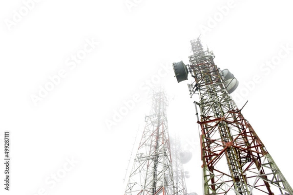 Fototapeta View looking up at telecommunication masts tailing off into the mist. Microwave link and TV transmitter towers. No people, white background.