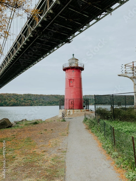 Obraz Red lighthouse on the shore