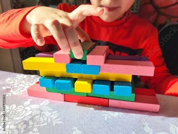 Obraz child playing with blocks