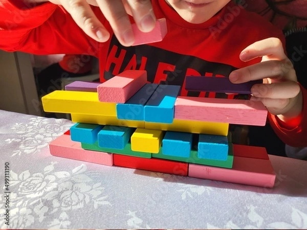 Obraz child playing with blocks