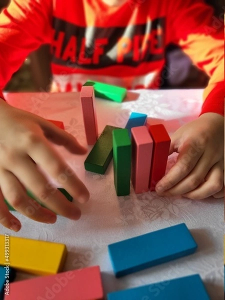 Obraz child playing with blocks
