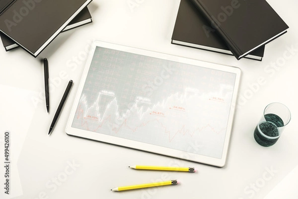 Fototapeta Top view of abstract creative financial diagram on modern digital tablet display, banking and accounting concept. 3D Rendering