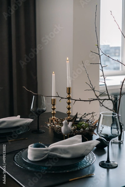 Obraz Easter table setting with crockery and colored eggs