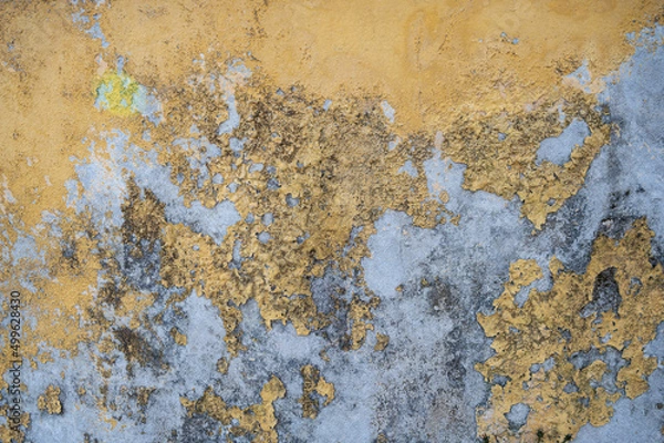 Fototapeta Chipped yellow wall texture with mold and mildew