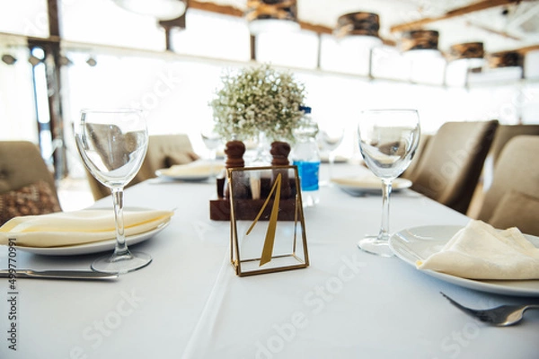Obraz Wedding table setting for guests in a restaurant