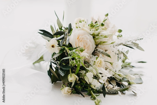 Fototapeta Beautiful wedding bouquet on isolated white background. High quality photo, natural light photography, wide open lens, depth of field