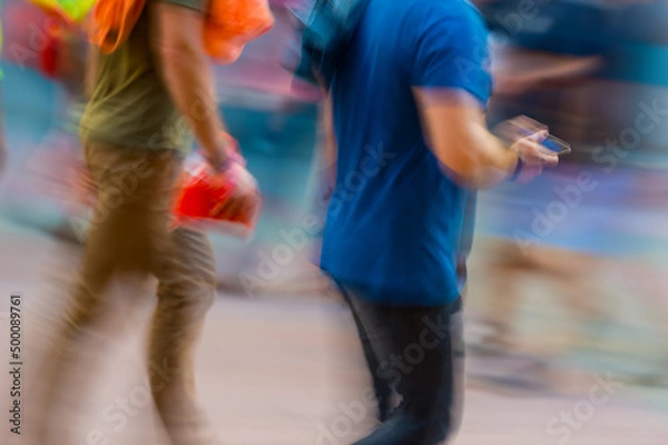 Obraz Person using phone, Motion blur