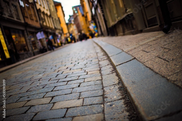 Obraz cobblestone road in the city