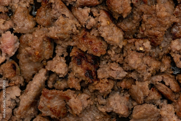Fototapeta Close up macro shot of fried sausage