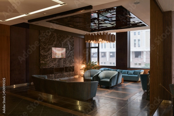Obraz waiting area in a modern house, large space for communication, tv area, fireplace