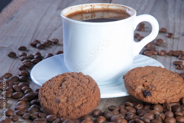 Fototapeta Fresh coffee with biscuits and roasted beans