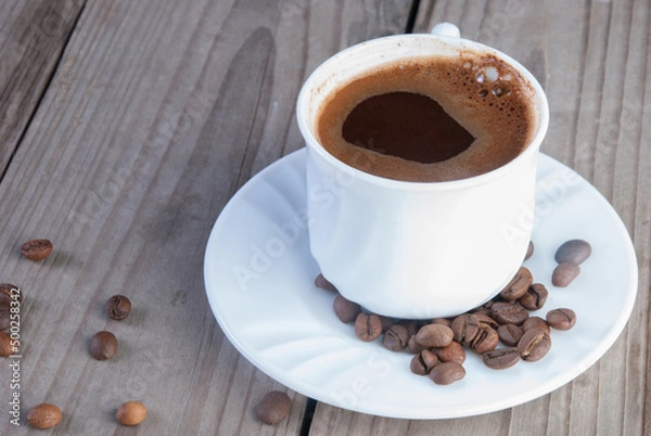 Fototapeta Roasted beans and brewed coffee