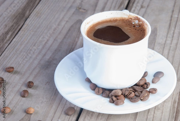 Fototapeta Roasted beans and brewed coffee
