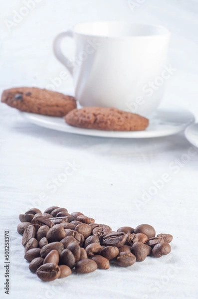 Fototapeta Fresh coffee with biscuits and roasted beans