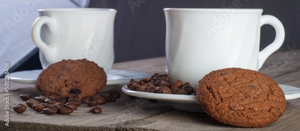 Fototapeta Fresh coffee with biscuits and roasted beans