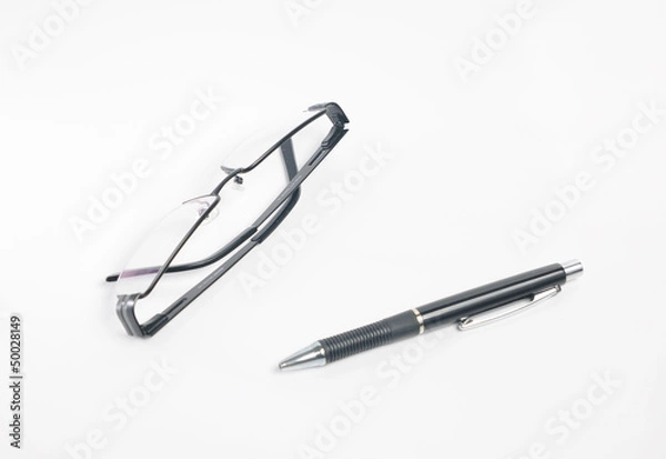 Obraz okulary i długopis