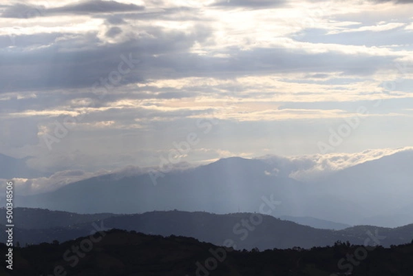 Fototapeta clouds over the mountains