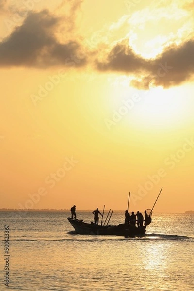 Obraz fishing boat at sunset