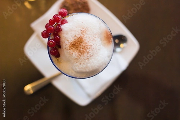 Fototapeta Coffee with red currant and cinnamon