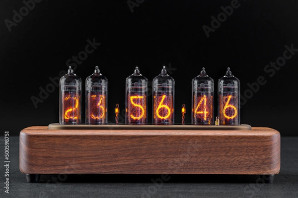 Fototapeta clock with discharge lamps in a wooden case