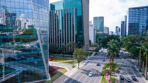 Obraz Aerial view of Avenida Brigadeiro Faria Lima, Itaim Bibi. Iconic commercial buildings in the background. With mirrored glass