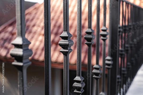 Fototapeta Modern metal railings and handrails in the loft style. The metal is treated with a primer and anti-corrosion paint. Interior design in industrial style.