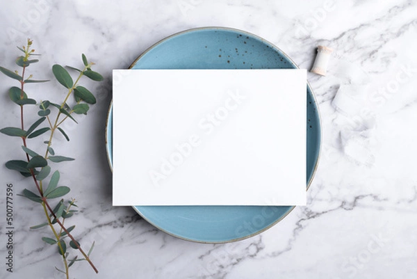 Obraz Wedding stationery invitation card mockup 5x7 on marble background with eucalyptus, Menu card mockup with festive wedding or birthday table setting, blue ceramic plate. Minimal blank card mockup