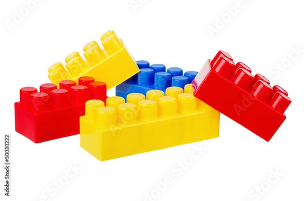 Fototapeta Multi-coloured Plastic building blocks, it is isolated on white