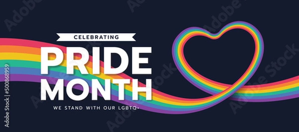 Fototapeta Celebrating pride month - long rainbow pride flag roll made to heart shape on black background vector design