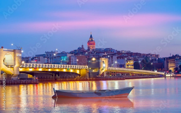 Obraz Galata Tower, Galata Bridge, Karakoy district and Golden Horn at morning with Closeup of wooden small boat floating on the sea - istanbul - Turkey