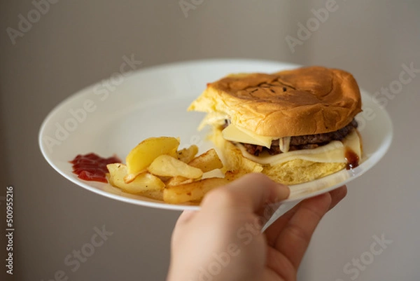 Fototapeta Handmade hamburger with french fries and dips made at home
