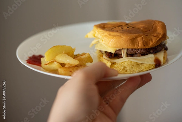 Fototapeta Handmade hamburger with french fries and dips made at home