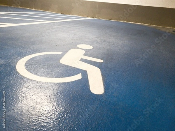 Obraz International Symbol of Access for Disabled People in an Underground Parking Lot