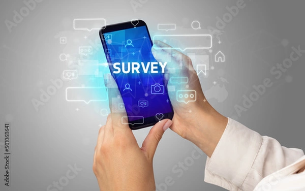 Fototapeta Hand using smartphone with social media concept