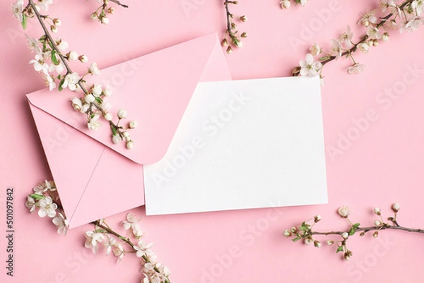 Fototapeta Greeting card mockup with envelope and white flowers on pink background