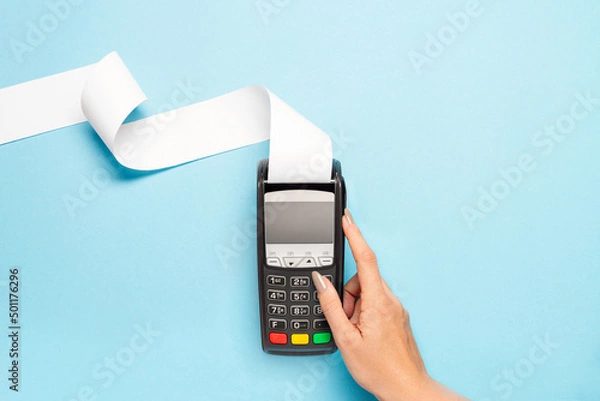 Obraz black pos terminal on blue background