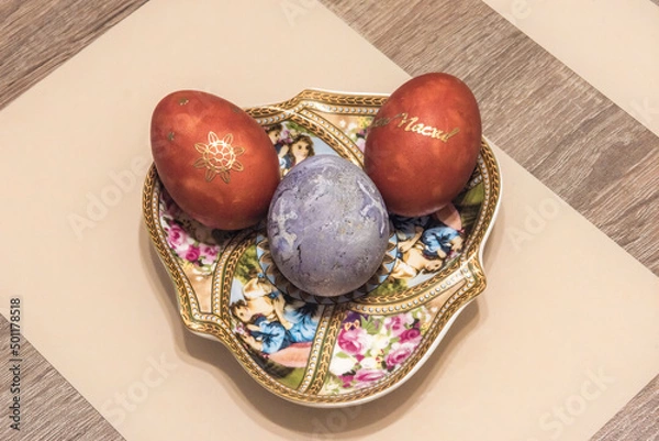 Fototapeta Image of Easter eggs on a saucer, original shape, close-up