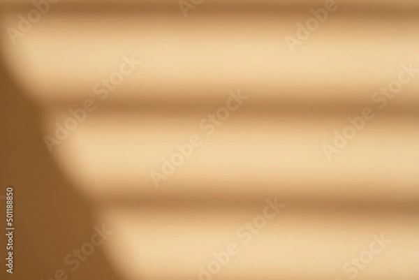 Fototapeta Creative copy space with shadows on soft beige wall. Window silhouette on the pastel background. Flat lay style. Minimalistic concept of summer, work from home, online shopping, products presentation